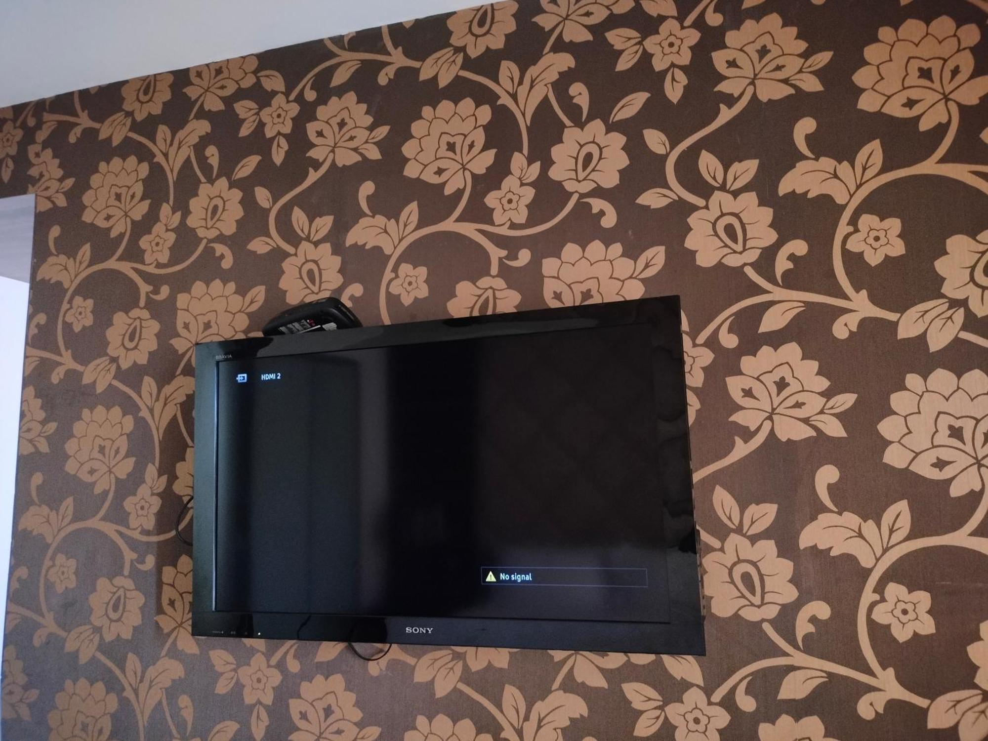 Holiday Inn Chandigarh Panchkula, An Ihg Hotel Exterior foto A television mounted on a wall